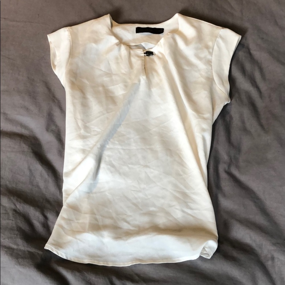 Cream cap sleeve shirt